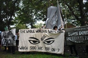 Protestors gather around Silent Sam on Aug. 20, 2018, hours before the statue was toppled. Photo by Janet Ayala