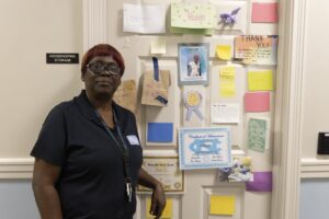 Robin Lee, a beloved housekeeper in Kenan Residence Hall, poses for a portrait on Monday, Sept. 12, 2022. Photo by Claire Jessen